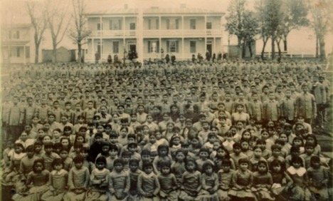 native american indians having been forcibly relocated to school
